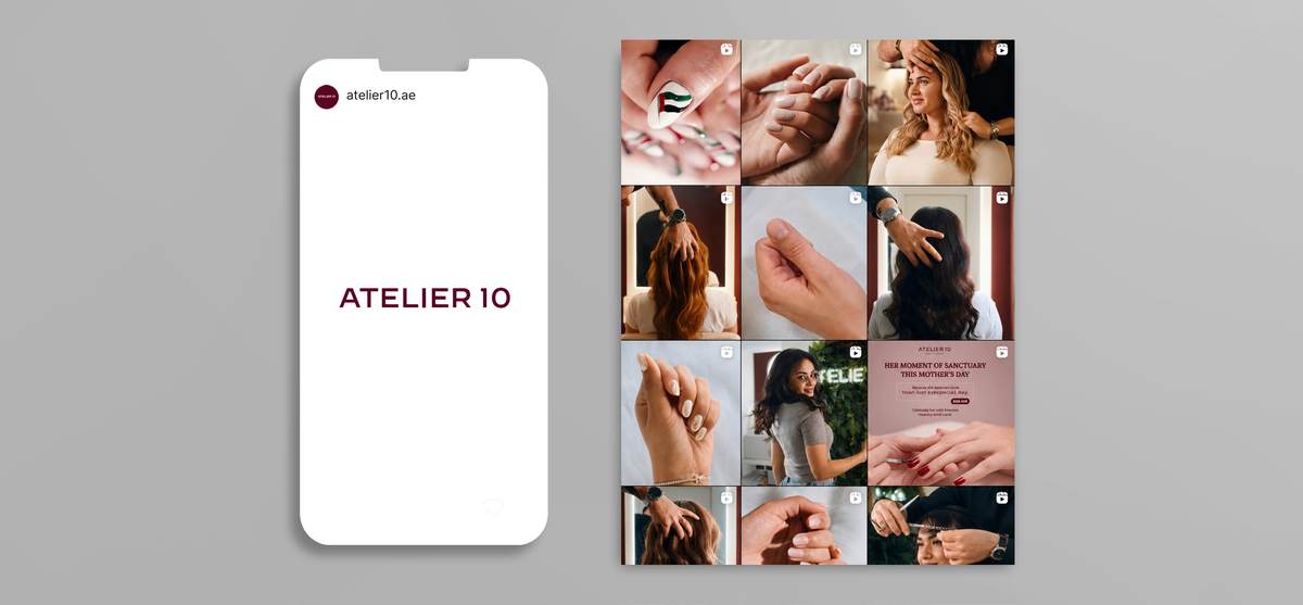 Phone showing the Atelier 10 Instagram profile beside a feed grid of nail and hair posts, UAE salon account.